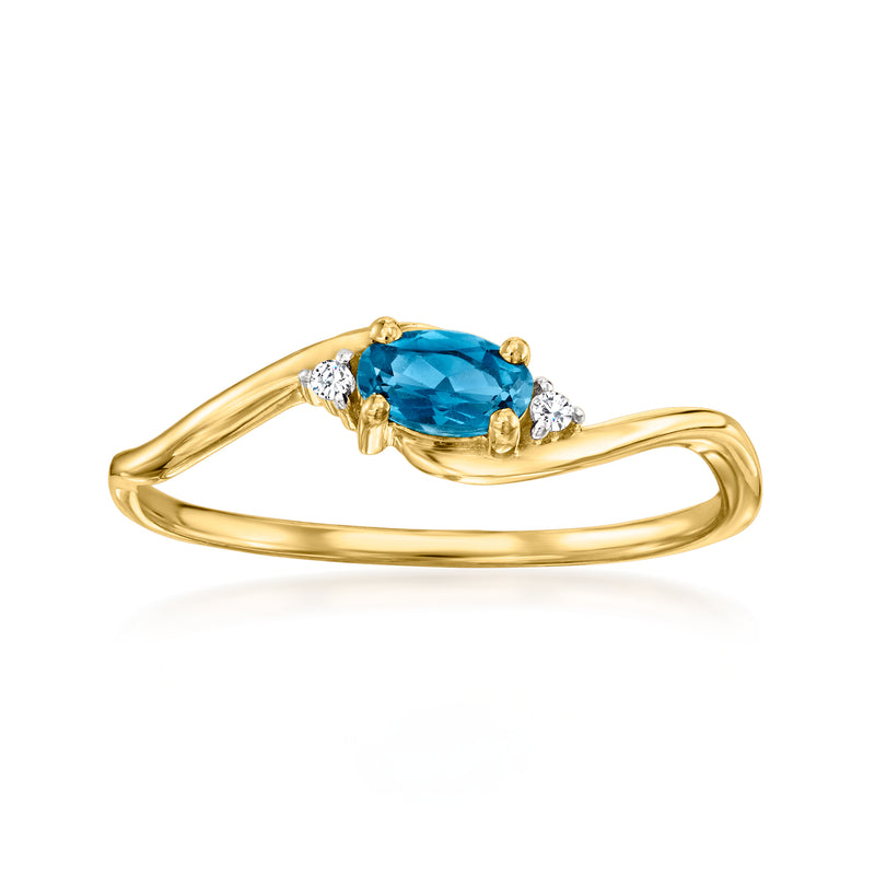 14kt yellow gold ring with oval London blue topaz and small diamond accents