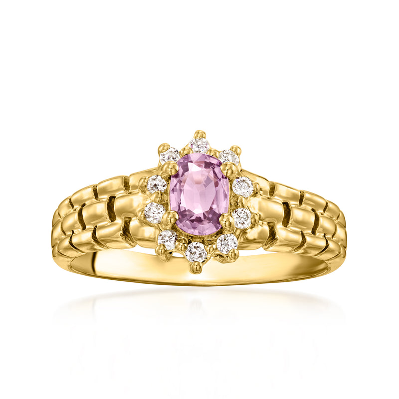 Vintage pink sapphire and diamond halo ring in 18kt yellow gold