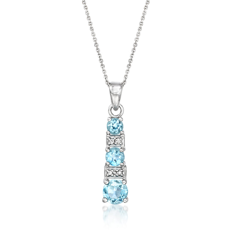 Vintage 10kt white gold pendant necklace with blue topaz and a single diamond