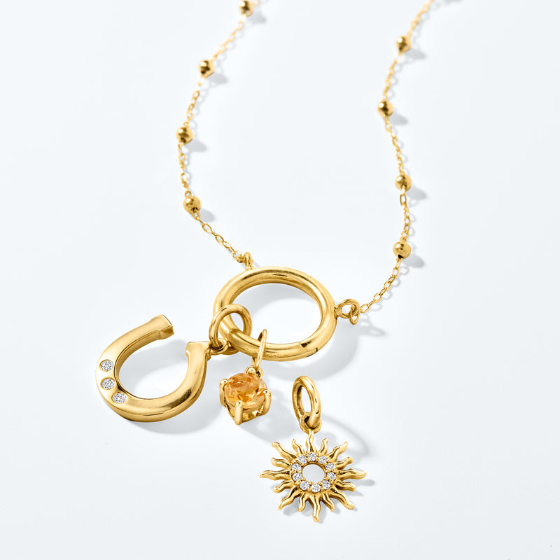 14kt yellow gold beaded link necklace with open ring and sunburst charm
