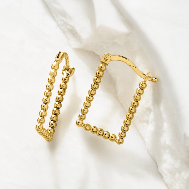 14kt yellow gold beaded rectangular hoop earrings, angled side view