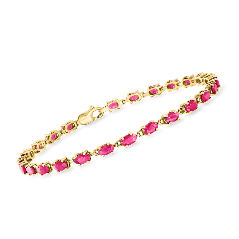 10kt yellow gold ruby tennis bracelet with prong-set oval pink gemstones