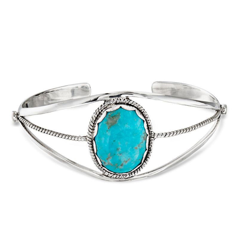 Sterling silver cuff bracelet with oval turquoise cabochon and braided rope border