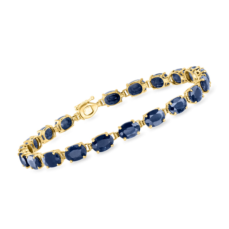 Vintage 14kt yellow gold sapphire tennis bracelet with oval blue stones
