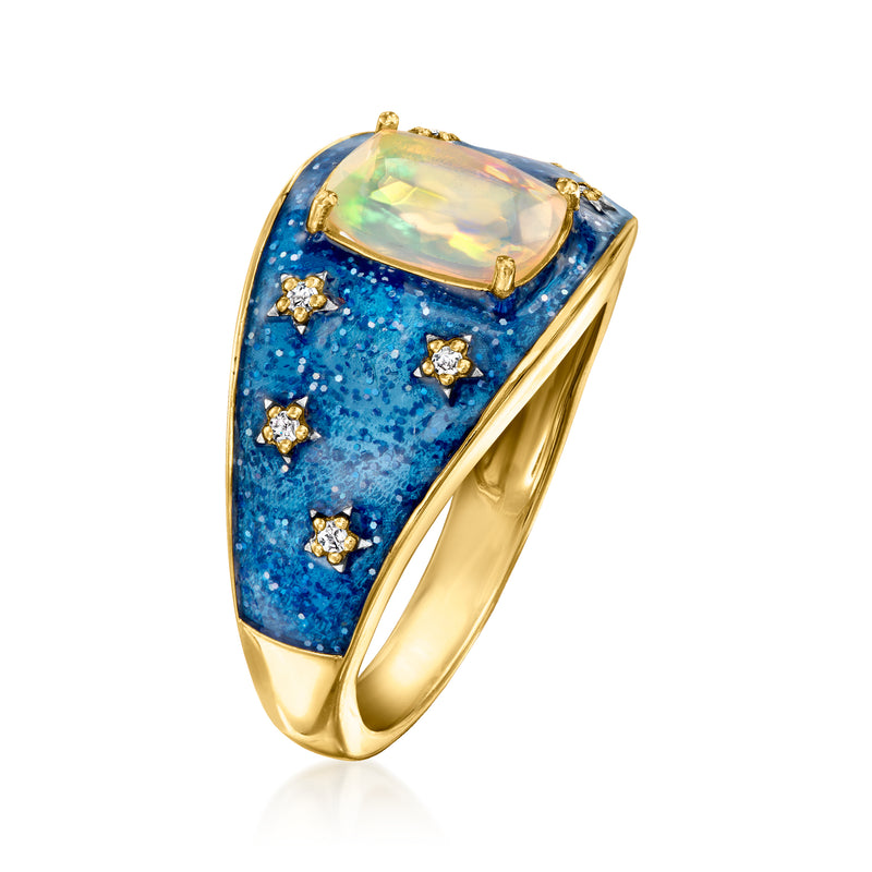 Gold-tone oval ring with blue glitter enamel, large opal-like stone, diamond-style stars