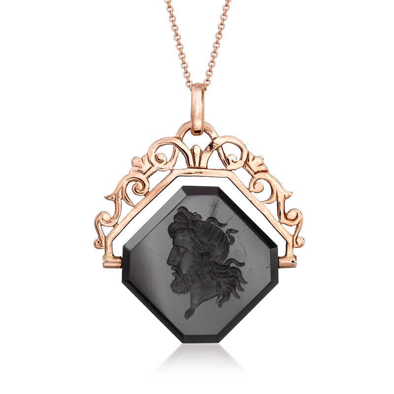 Rose gold onyx intaglio pendant necklace with octagonal dark gemstone and relief figure