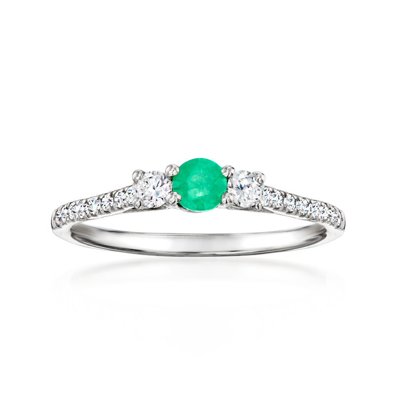Platinum ring with round emerald and lab-grown diamond accents