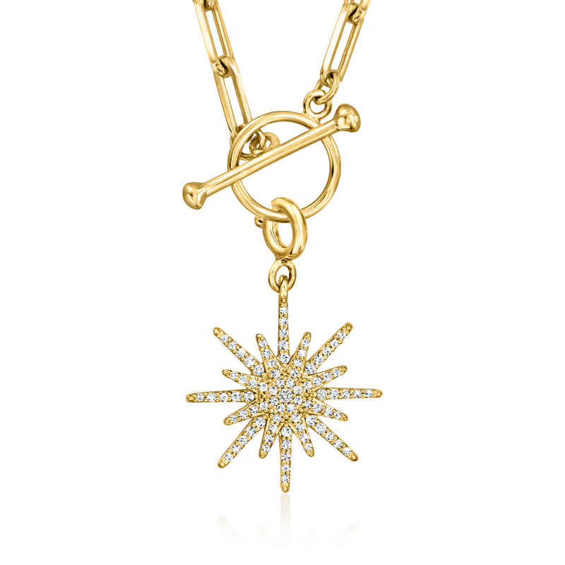 Gold over sterling starburst charm pendant with diamond-like pave details and loop bail