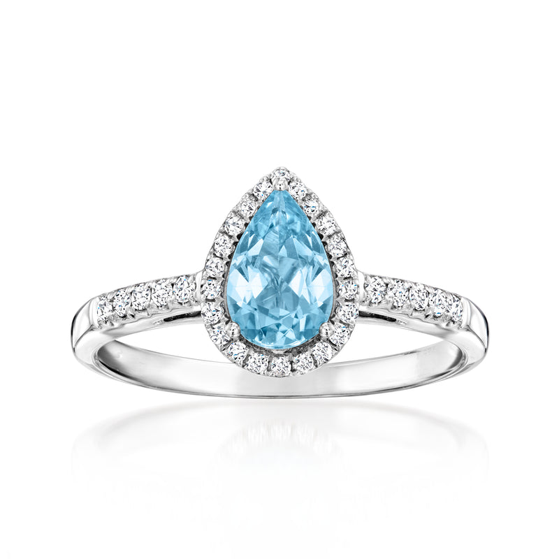 Aquamarine and diamond halo ring in 18kt white gold with pear-cut center stone