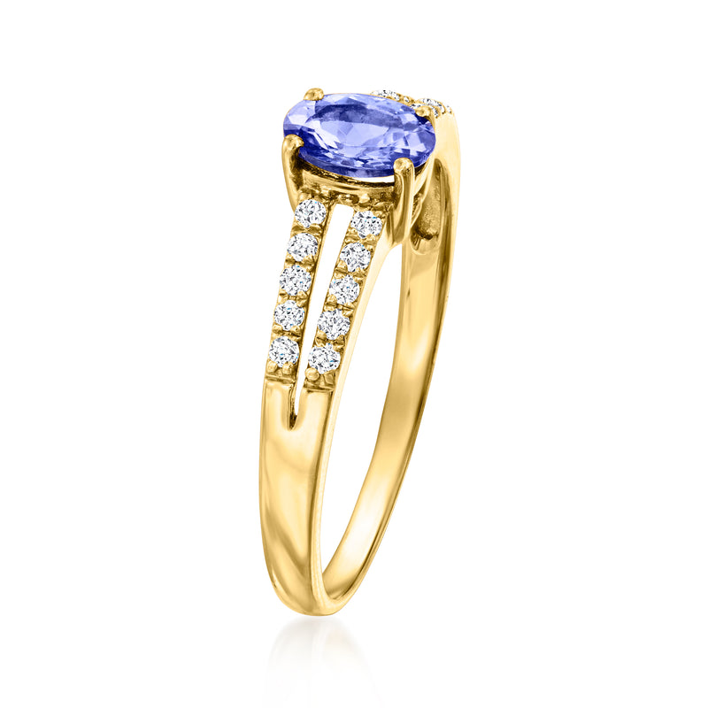 14kt yellow gold tanzanite ring with raised oval center stone and diamond side band