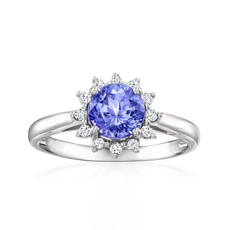 14kt white gold tanzanite ring with round halo of small diamonds