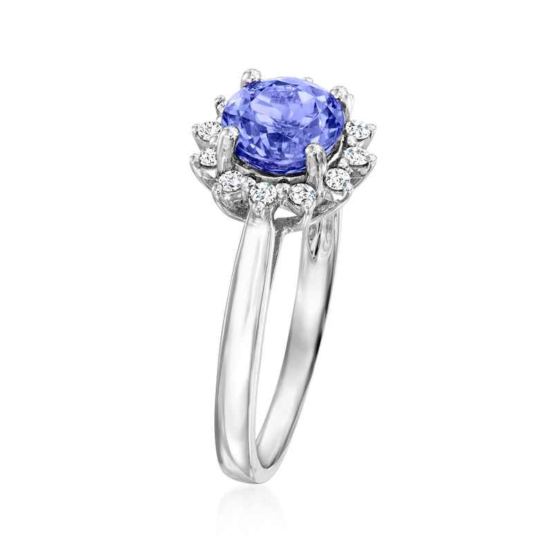 14kt white gold ring with oval blue tanzanite center and diamond halo