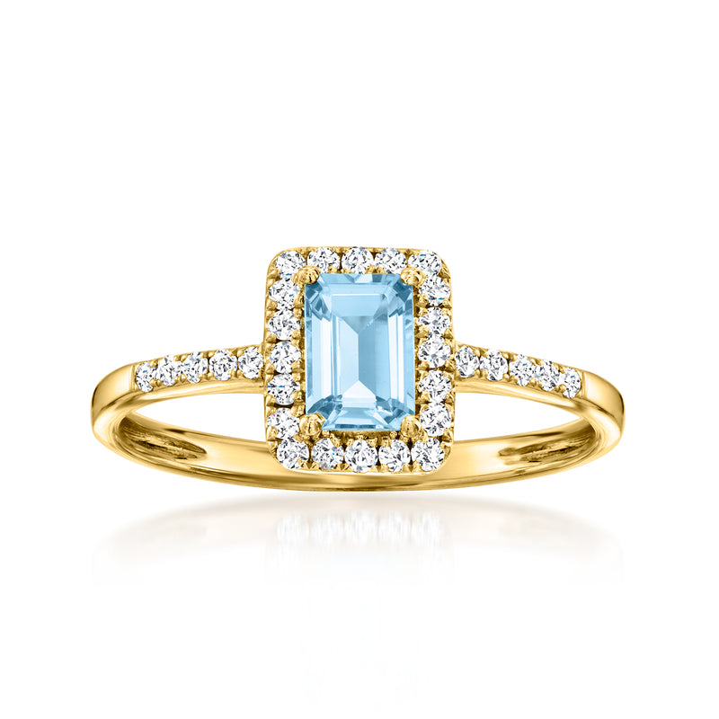 Aquamarine halo ring in 18k yellow gold with diamond accents, cushion-cut center
