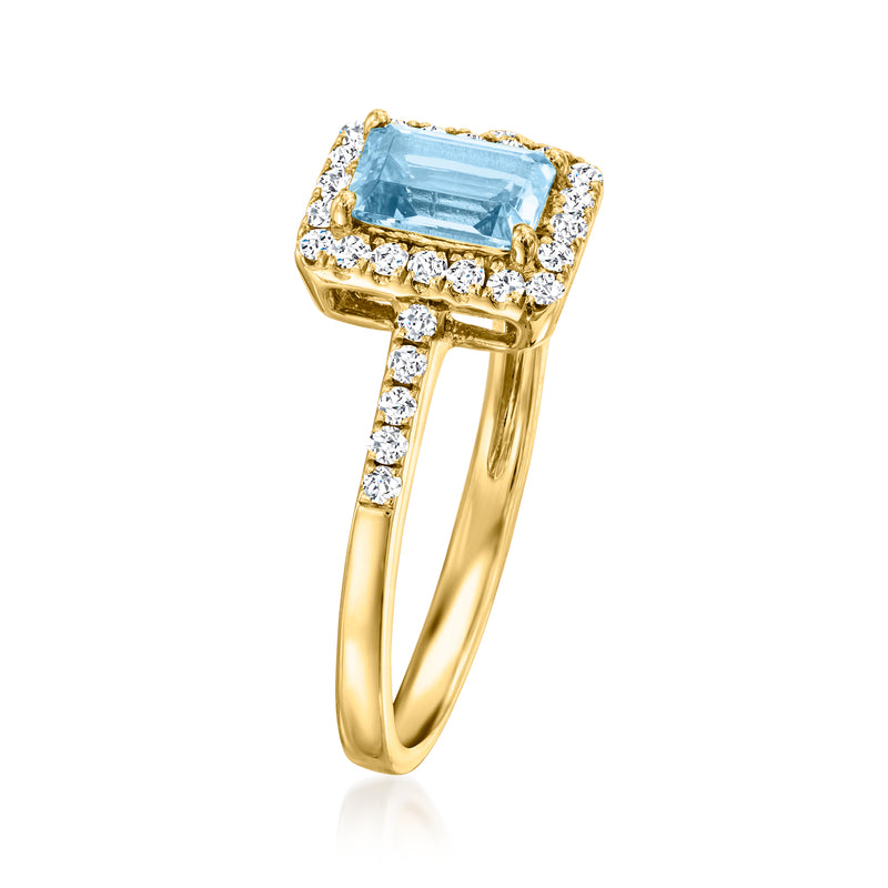18k yellow gold aquamarine ring with baguette-cut diamond halo and side stones