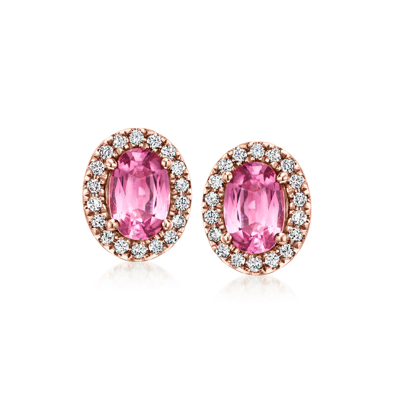 Oval pink spinel stud earrings in 18kt rose gold with diamond halo, post backs