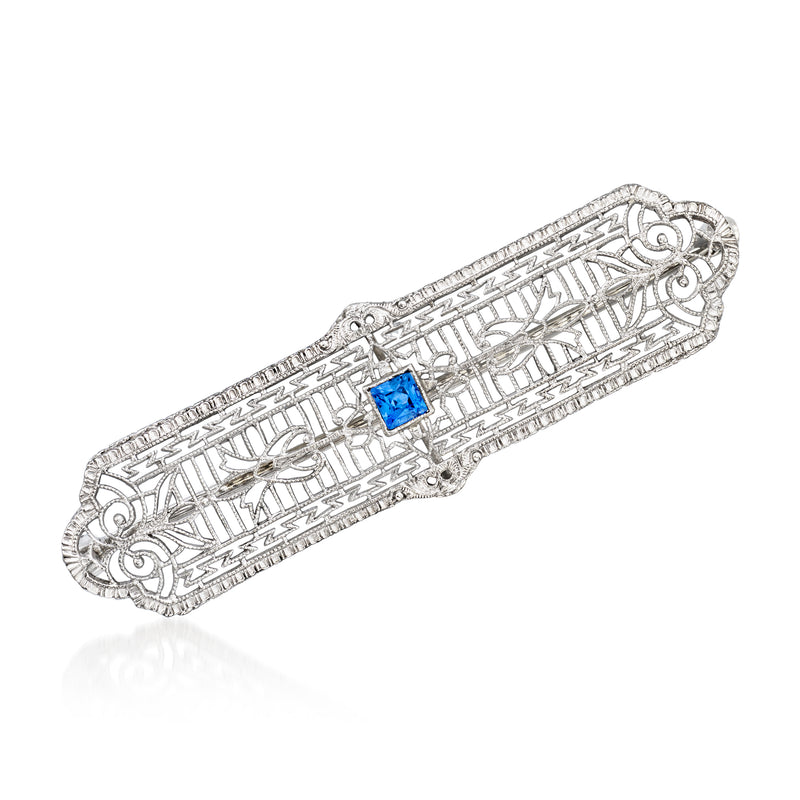 Platinum and white gold filigree bar pin with blue square sapphire center