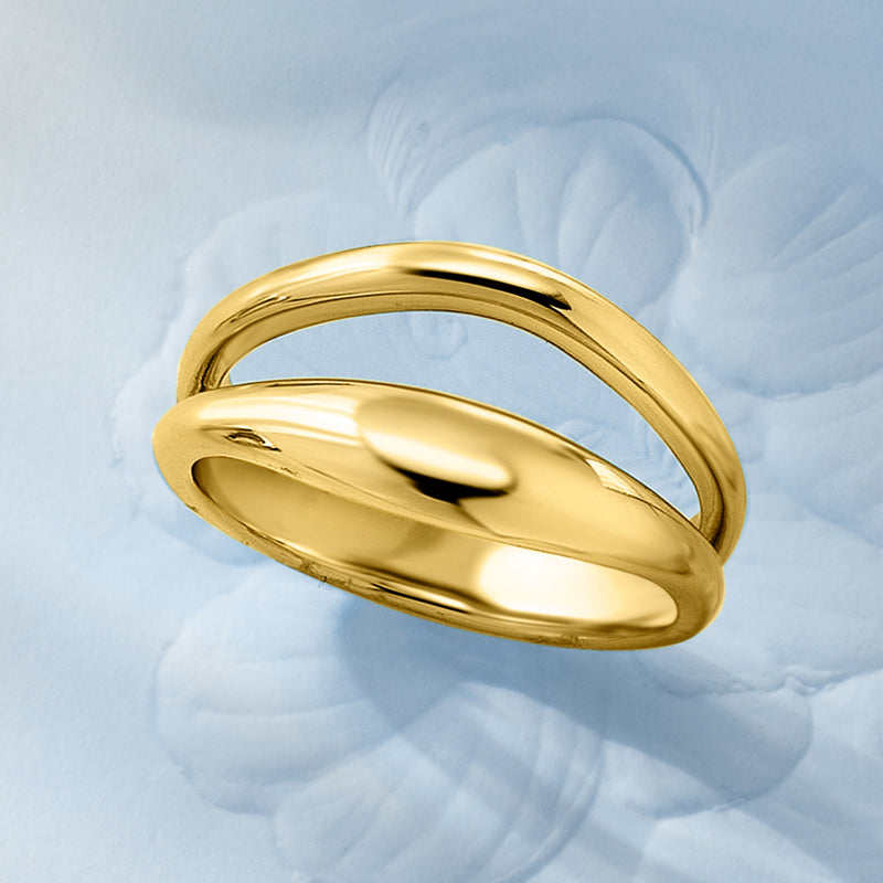 Smooth two-row gold over sterling ring, domed top, angled view