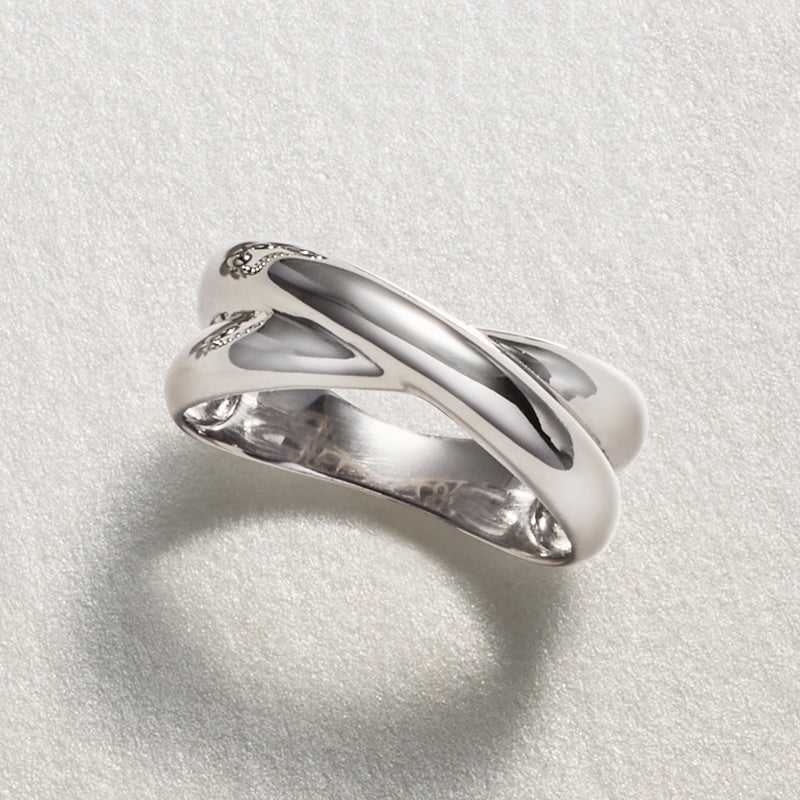 Sterling silver puffed crisscross ring, open top view showing band overlap