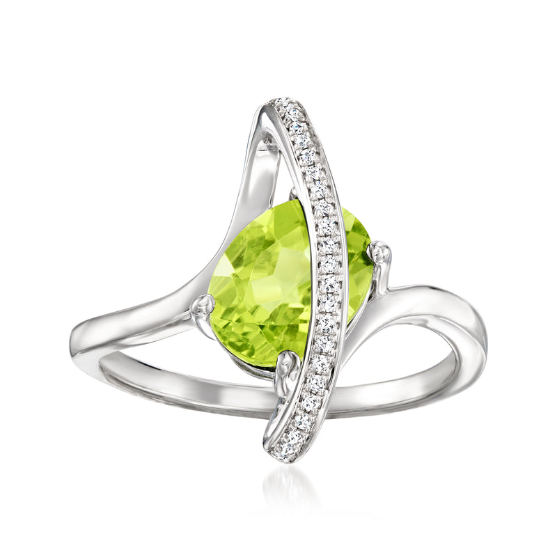 Sterling silver peridot and diamond ring with pear-cut green gemstone, split prongs