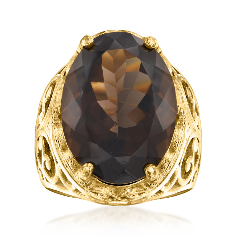 Smoky quartz oval ring with dark gemstone set in gold over sterling band