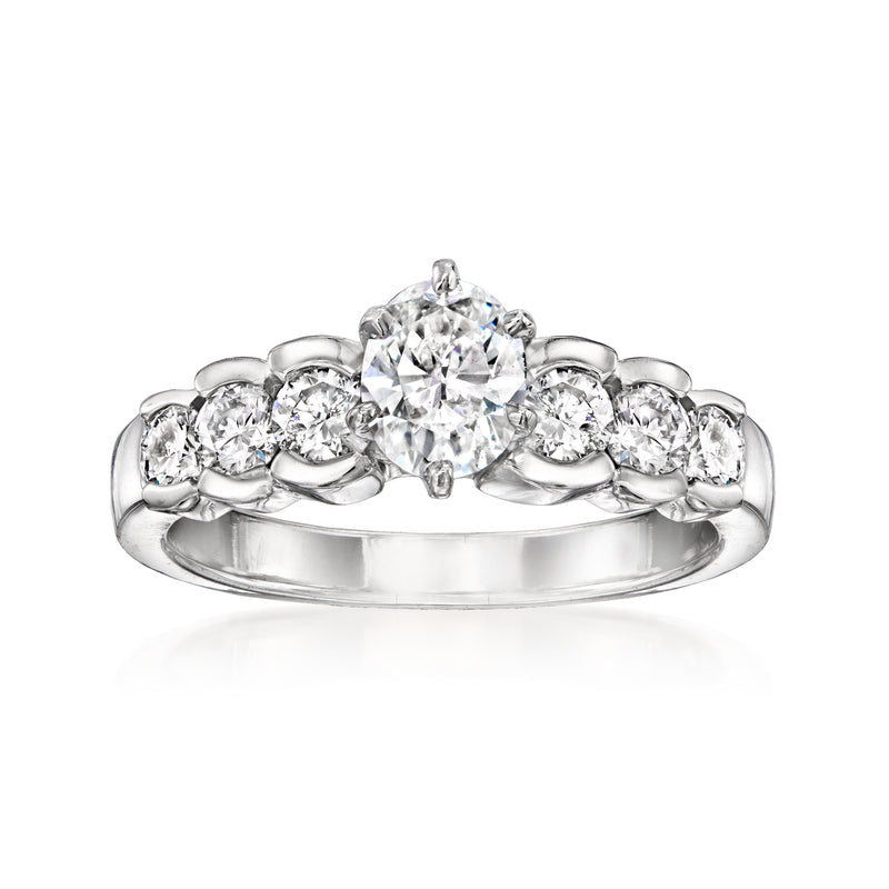 Vintage 14kt white gold diamond ring with round center stone and side diamonds