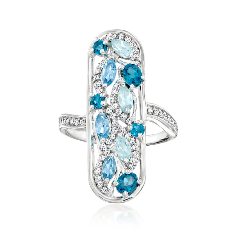 Sterling silver ring with oval blue and white gemstones in prong halo setting