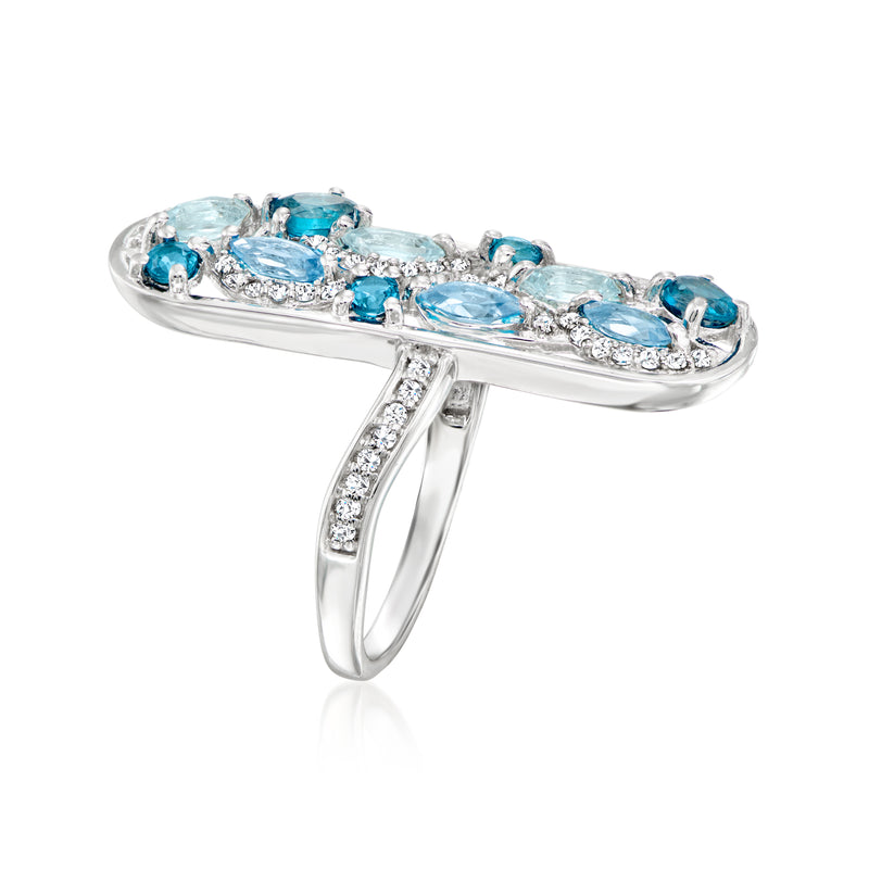 Sterling silver ring with elongated oval blue gemstones and small round accents