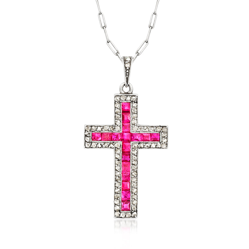 Cross pendant necklace with pink center, clear diamond accents, silver chain