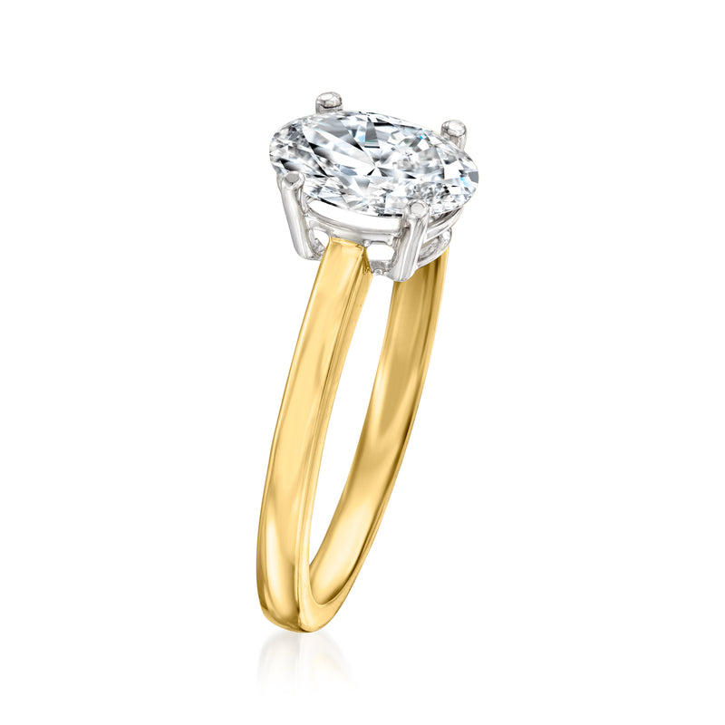 Two-tone gold solitaire ring with oval lab-grown diamond in prong setting