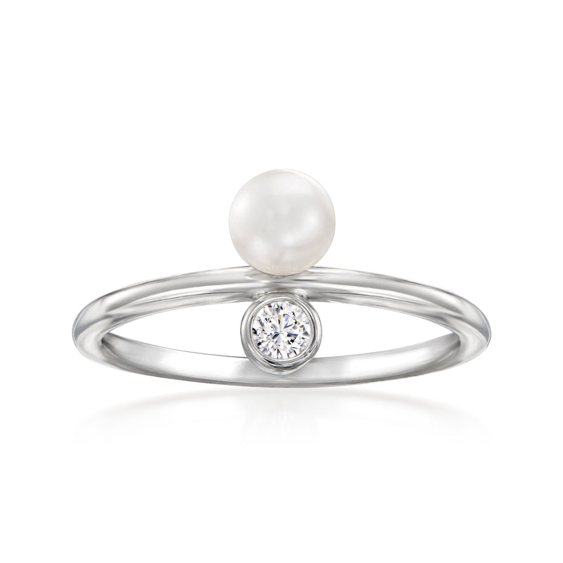 Sterling silver ring with white cultured pearl and round CZ bezel setting