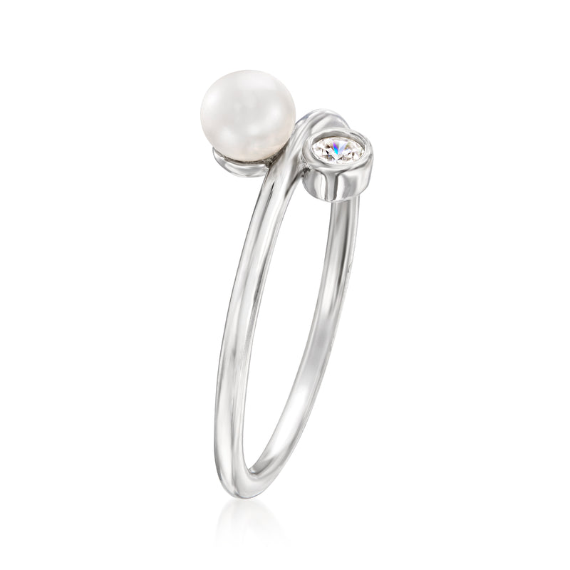 Sterling silver ring with cultured pearl top and round CZ on curved band