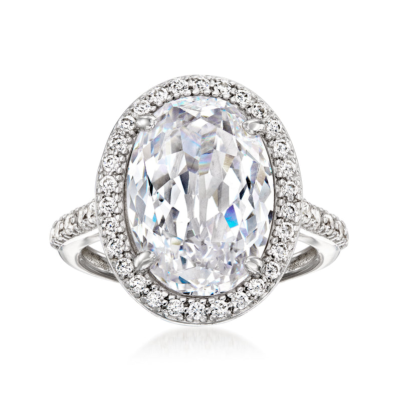 Sterling silver CZ ring with oval center stone and round halo, prong-set