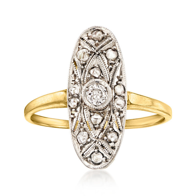 Vintage diamond ring with oval platinum setting and yellow gold band