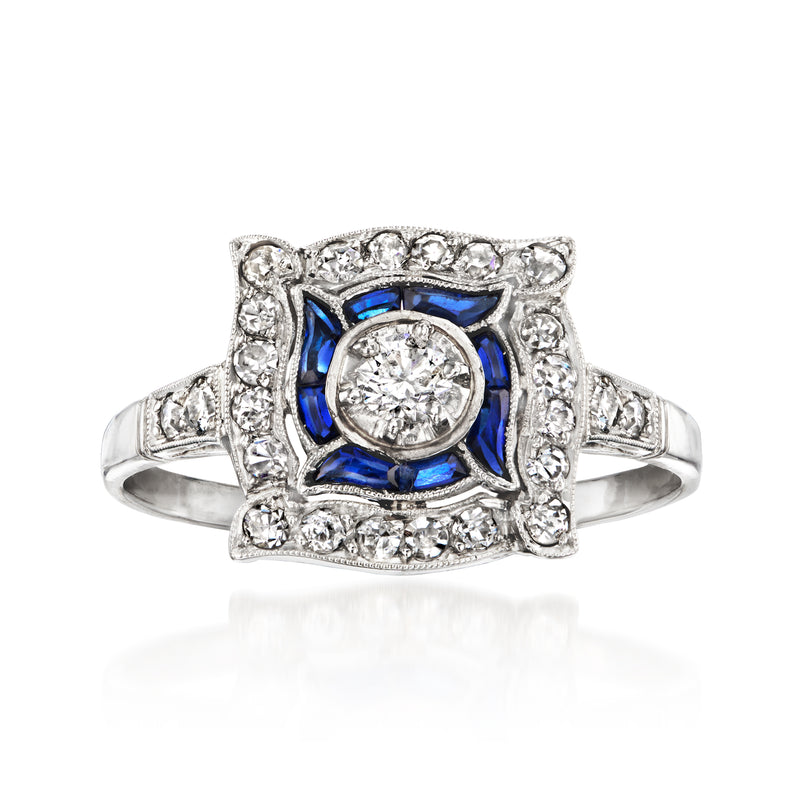 Vintage sapphire and diamond cluster ring in platinum, square halo with round center stone