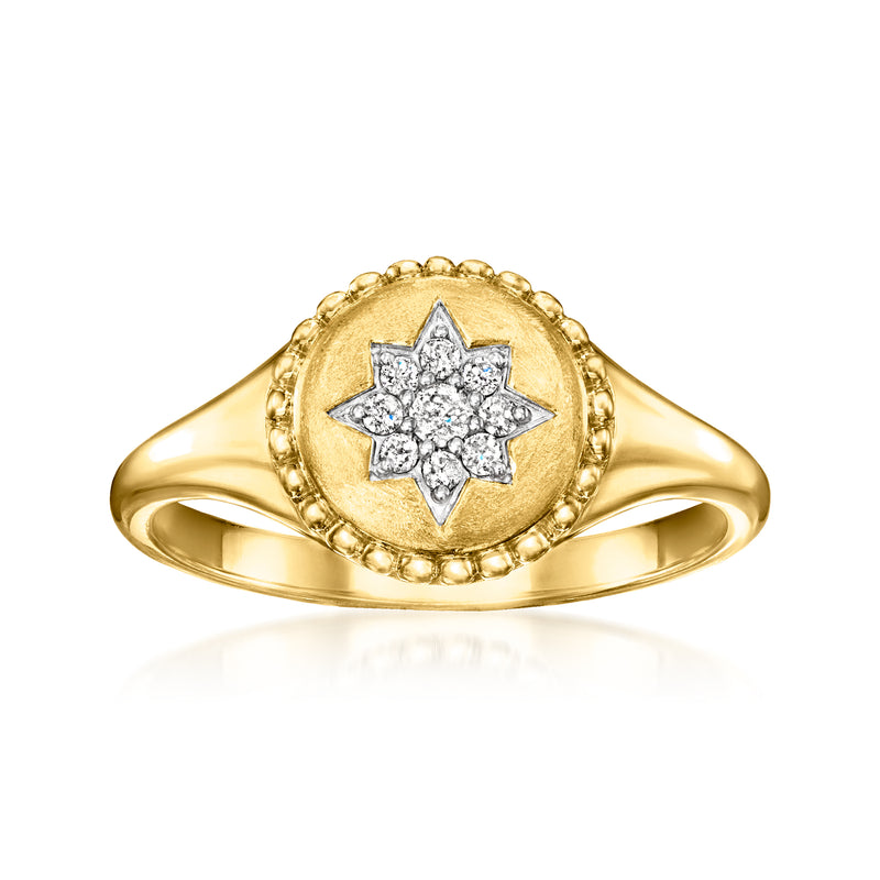 Gold star signet ring with bezel-set diamond cluster center