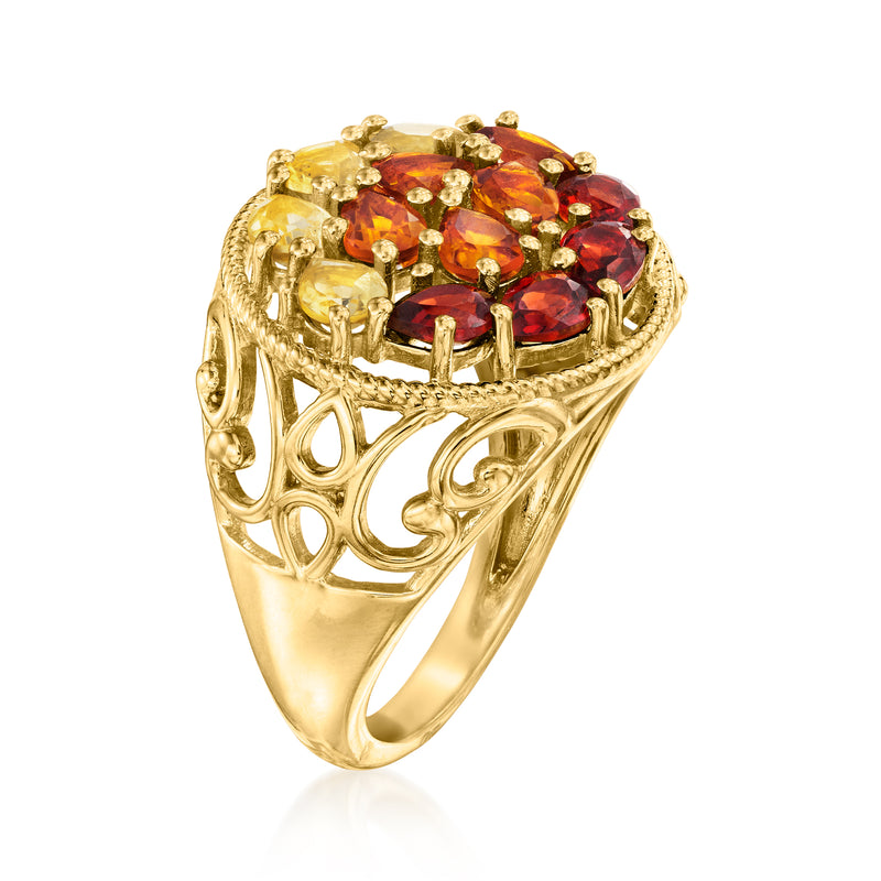 Gold ring with filigree openwork and oval ruby-red and yellow gemstones cluster