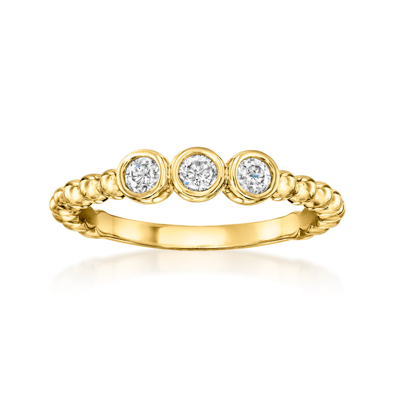 Three-stone diamond bezel ring in gold over sterling with beaded shoulders
