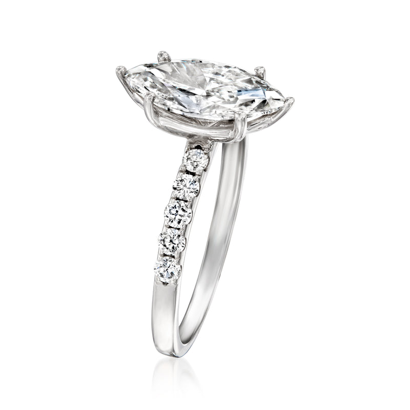 14kt white gold ring with prong-set marquise diamond center and small side diamonds