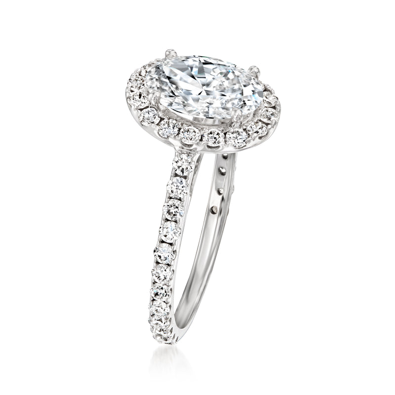 Lab-grown diamond ring in 14kt white gold with oval halo and pavé band