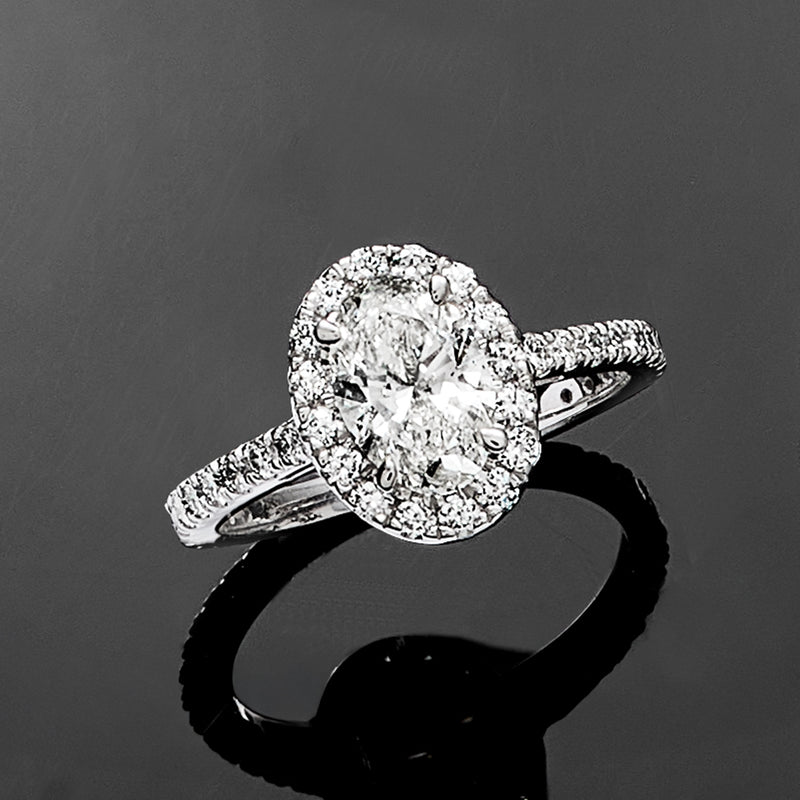 Lab-grown diamond ring in 14kt white gold with oval halo setting