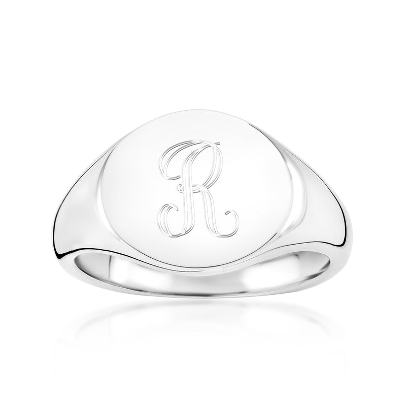 Oval sterling silver signet ring with engraved monogram on top