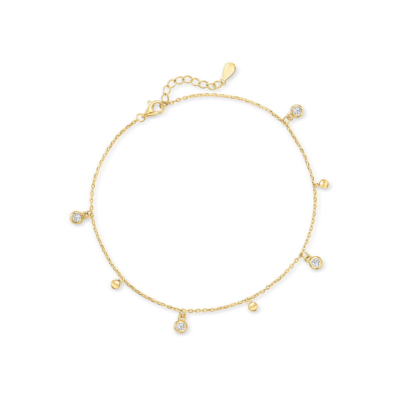 Gold-tone CZ bead station anklet with bezel-set round stones, adjustable chain