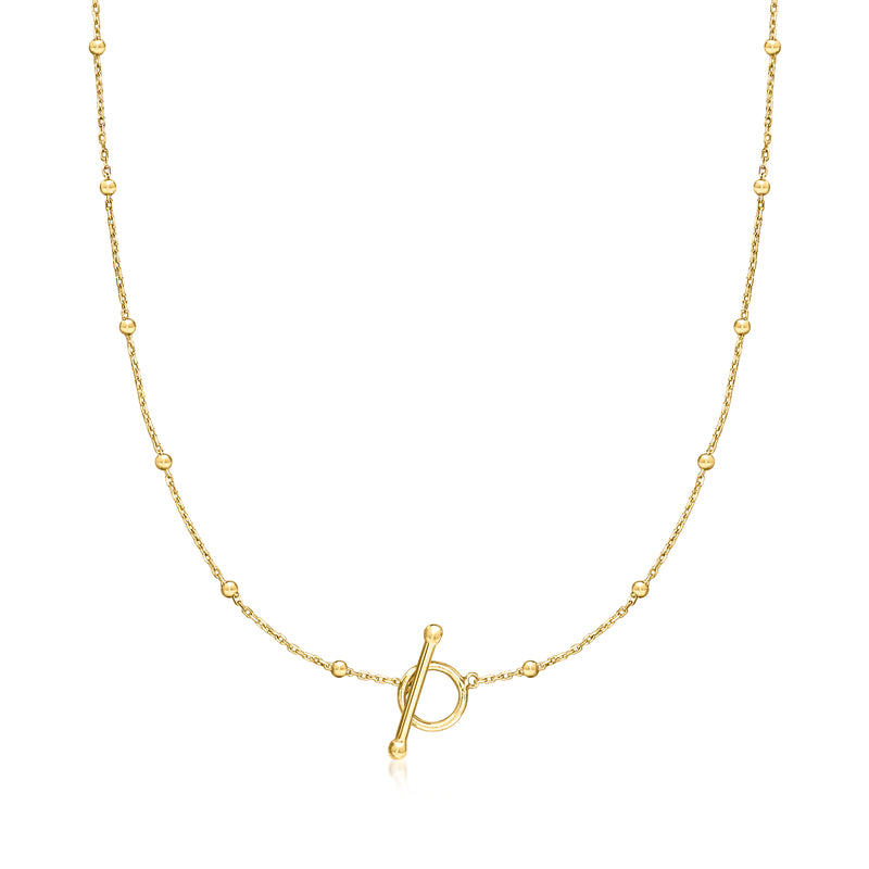 Gold bead-station toggle necklace with round beads and open clasp