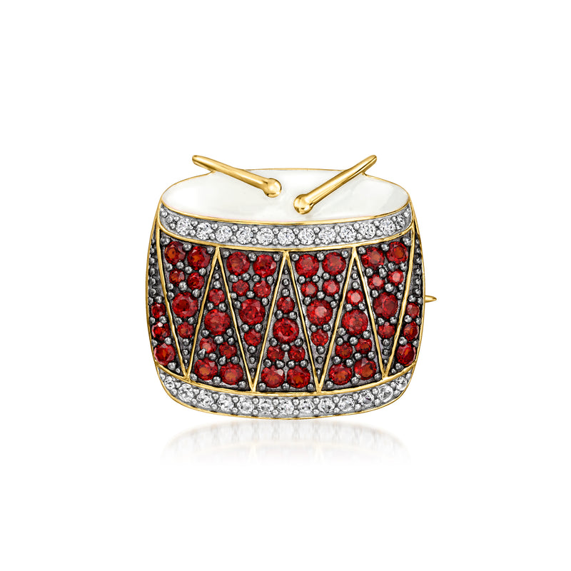 Gold-tone drum pendant with red stones, white enamel, and clear zircon border.