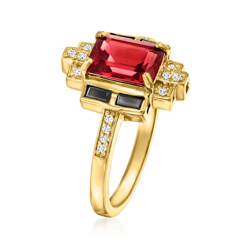 Gold square-set ring with red garnet gemstone and black and white side stones