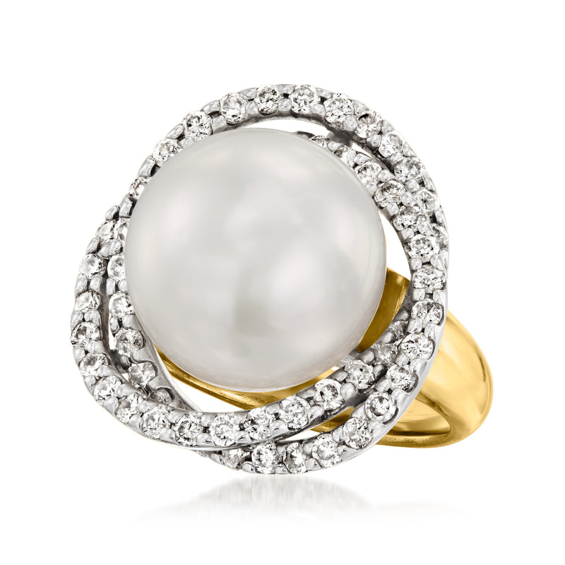 Vintage two-tone gold ring with large pearl and diamond halo