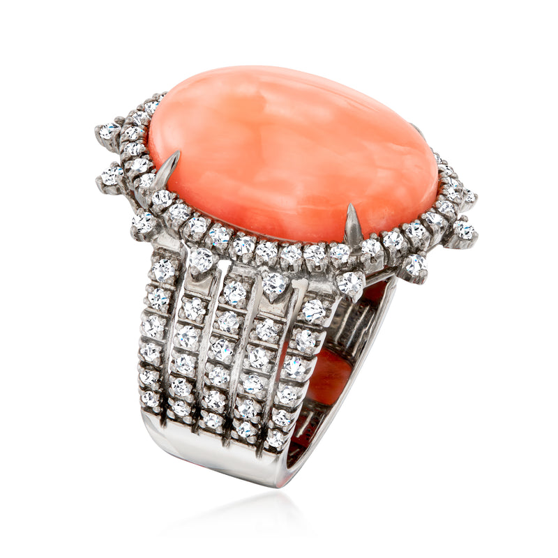 Vintage coral ring with diamond halo in white gold