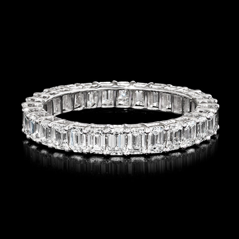 White gold eternity band, emerald-cut lab-grown diamonds in a continuous ring.