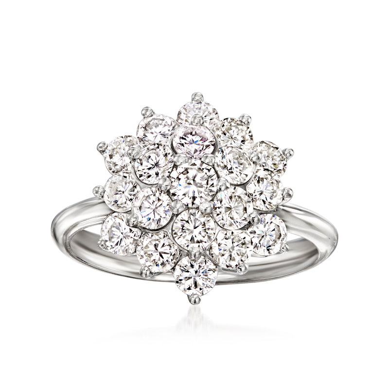 Vintage platinum diamond cluster ring with round prong-set stones
