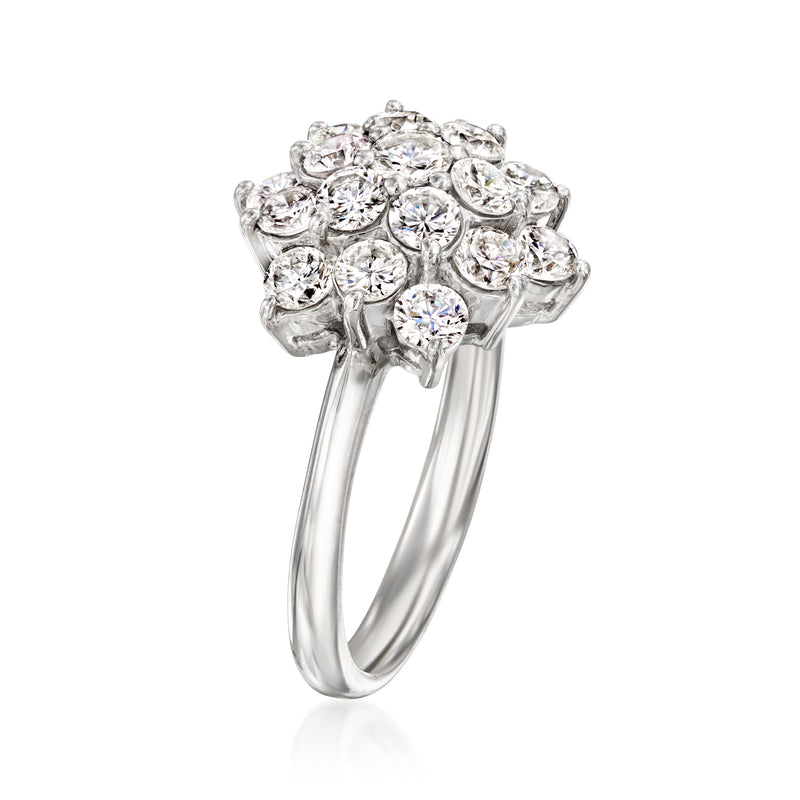 Platinum prong-set diamond cluster ring with round center stone and side diamonds